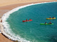 Sea Kayaking Paddling toward Beach - Yoga Retreat - Mexico
