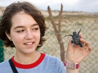 Girl with Baby Sea Turtle - Yoga Retreat - Mexico