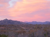 The Sunset Lights up the Clouds over the Mountains- Yoga Retreat - Mexico
