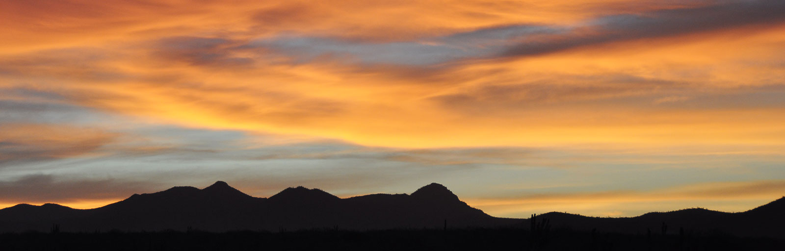 Hiking & Yoga Retreat in Mexico: Sunset and Mountain Silhouette